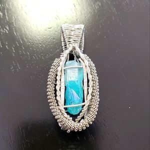 The ice dragons fang / intricate wire wrapped pendant with quartz crystal